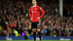 (FILES) In this file photo taken on October 09, 2022 Manchester United's Portuguese striker Cristiano Ronaldo looks on during the English Premier League football match between Everton and Manchester United at Goodison Park in Liverpool, north west England. - Cristiano Ronaldo's controversial second spell at Manchester United is to end with "immediate effect", the Premier League giants announced on November 22, 2022. The Portugal forward appeared to be on his way out of Old Trafford following a recent television interview in which he said he felt "betrayed" by the club and had no respect for new manager Erik ten Hag. (Photo by Oli SCARFF / AFP) / RESTRICTED TO EDITORIAL USE. No use with unauthorized audio, video, data, fixture lists, club/league logos or 'live' services. Online in-match use limited to 120 images. An additional 40 images may be used in extra time. No video emulation. Social media in-match use limited to 120 images. An additional 40 images may be used in extra time. No use in betting publications, games or single club/league/player publications. / 