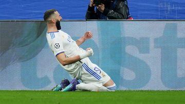 MADRID, SPAIN - MARCH 09: Karim Benzema of Real Madrid celebrates their sides second goal during the UEFA Champions League Round Of Sixteen Leg Two match between Real Madrid and Paris Saint-Germain at Estadio Santiago Bernabeu on March 09, 2022 in Madrid,