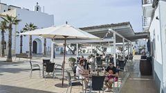 FORMENTERA, SPAIN - MAY 06: Neighbours from Formentera are enjoying on a terrace in Plaza de Sant Francesc on May 06, 2020 in Formentera, Spain. Among its 12,000 inhabitants (approximately) currently registered, there have been seven people infected with 