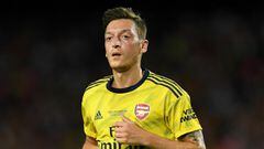 Özil could come in from the cold to captain Arsenal at Anfield
