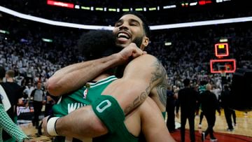 May 27, 2023; Miami, Florida, USA; Boston Celtics guard Derrick White (9) celebrates with forward Jayson Tatum (0) after defeating the Miami Heat in game six of the Eastern Conference Finals for the 2023 NBA playoffs at Kaseya Center. Mandatory Credit: Sam Navarro-USA TODAY Sports