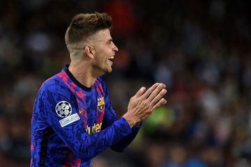 Piqué reacts during Barcelona's 1-0 Champions League victory over Dynamo Kiev on Wednesday - a game in which the defender scored the winning goal for the Blaugrana.