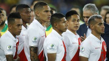Peru players line up to receive their second place medals after losing 1-3 to Brazil during the final soccer match of the Copa America at the Maracana stadium in Rio de Janeiro, Brazil, Sunday, July 7, 2019. (AP Photo/Victor R. Caivano)