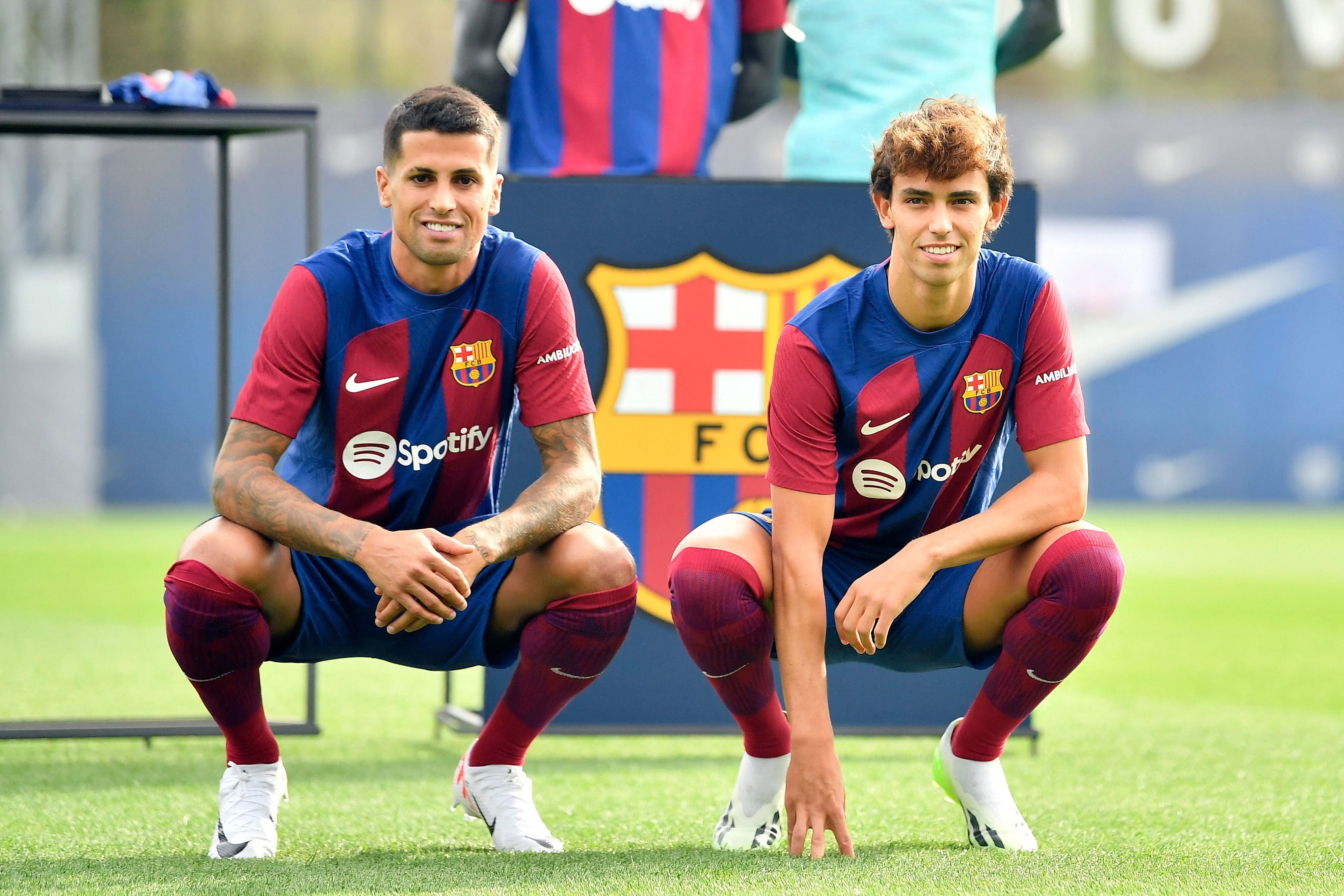 Joao Felix y Joao Cancelo