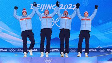 ZHANGJIAKOU, CHINA - FEBRUARY 18: Gold Medallists Jens Luraas Oftebro, Espen Andersen, Espen Bjoernstad and Joergen Graabak of Team Norway celebrate during the Men&rsquo;s Large Hill/4x5km Medal Ceremony on Day 14 of the Beijing 2022 Winter Olympic Games 
