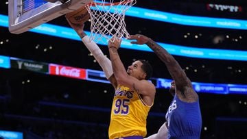 Oct 20, 2022; Los Angeles, California, USA; Los Angeles Lakers forward Juan Toscano-Anderson (95) shoots the ball against LA Clippers guard John Wall (11) in the first half at Crypto.com Arena. Mandatory Credit: Kirby Lee-USA TODAY Sports