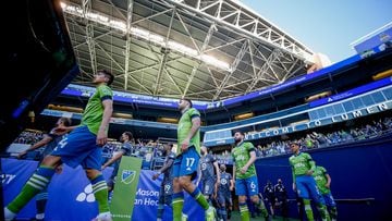 Seattle Sounders FC enter the field before the start of a game at Lumen Field.