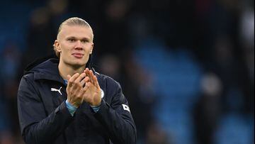 Manchester City's Norwegian striker Erling Haaland applauds at the end of the English Premier League football match between Manchester City and Wolverhampton Wanderers  at the Etihad Stadium in Manchester, north west England, on January 22, 2023. - Manchester City won 3 - 0 against Wolverhampton Wanderers. (Photo by Paul ELLIS / AFP) / RESTRICTED TO EDITORIAL USE. No use with unauthorized audio, video, data, fixture lists, club/league logos or 'live' services. Online in-match use limited to 120 images. An additional 40 images may be used in extra time. No video emulation. Social media in-match use limited to 120 images. An additional 40 images may be used in extra time. No use in betting publications, games or single club/league/player publications. / 