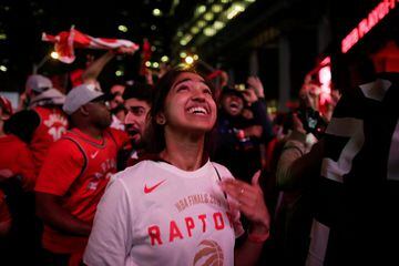Fans celebrate after the Toronto Raptors defeated the Golden State Warriors in Oakland, California in Game Six of the best-of-seven NBA Finals, in Toronto, Ontario, Canada, June 14, 2019.  