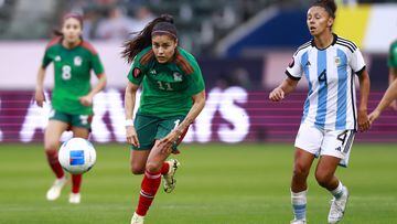  Lizbeth Ovalle (L) of Mexico fights for the ball with Julieta Cruz (R) of Argentina  during the Group stage, Group A match between Mexico (Mexico National team) and Argentina as part of the Concacaf Womens Gold Cup 2024, at Dignity Health Sports Park Stadium on February 20, 2024 in Carson California, United States.
