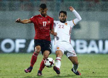 Football Soccer - Albania v Spain - World Cup 2018 Qualifiers - Loro Borici Stadium, Shkoder, Albania -9/10/16. Albania's Naser Aliji (L) and Spain's Isco in action. REUTERS/Antonio Bronic