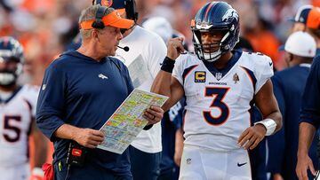 Denver Broncos head coach Sean Payton talks with quarterback Russell Wilson (3)