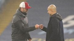 MANCHESTER, ENGLAND - NOVEMBER 08: Jurgen Klopp, Manager of Liverpool interacts with Pep Guardiola, Manager of Manchester City following the Premier League match between Manchester City and Liverpool at Etihad Stadium on November 08, 2020 in Manchester, E