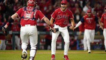 Los Angeles Angels starting pitcher Reid Detmers celebrates with catcher Chad Wallach after throwing a no-hitter against the Tampa Bay Rays at Angel Stadium.