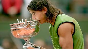 Rafael Nadal poses with the winners trophy after his 3-1 victory over Mariano Puerta at the French Open on June 5, 2005 in Paris, France.