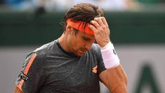 Ferrer labels French Open "a scam" as rain row thunders on