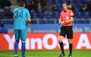 Franco Armani of Atletico Nacional reacts as Match Referee, Viktor Kassai, awards a penalty for Kashima Antler after he used the video assistant referee to make the decision during the FIFA Club World Cup Semi Final match between Atletico Nacional and Kas
