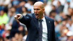 Zinedine Zidane on the touchline during a Real Madrid game.