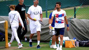 Novak Djokovic (right) during a practice session ahead of the 2022 Wimbledon Championship at the All England Lawn Tennis and Croquet Club, Wimbledon. Picture date: Saturday June 25, 2022. (Photo by John Walton/PA Images via Getty Images)