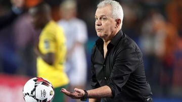 Soccer Football - Africa Cup of Nations 2019 - Round of 16 - Egypt v South Africa - Cairo International Stadium, Cairo, Egypt - July 6, 2019  Egypt coach Javier Aguirre with the match ball   REUTERS/Amr Abdallah Dalsh