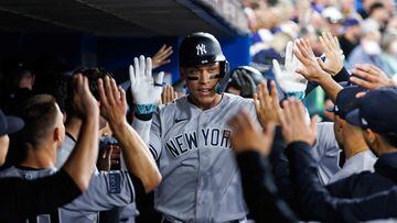 TORONTO, CANADA - SEPTEMBER 27: Aaron Judge #99 of the New York Yankees celebrates a two-run home run in the fourth inning of their MLB game against the Toronto Blue Jays at Rogers Centre on September 27, 2023 in Toronto, Canada.   Cole Burston/Getty Images/AFP (Photo by Cole Burston / GETTY IMAGES NORTH AMERICA / Getty Images via AFP)