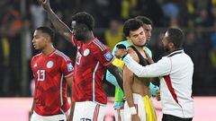 Colombia's defenders Willer Ditta (L) and Davinson Sanchez (2-L) and forward Luis Diaz (2-R) leave the field at the end of the 2026 FIFA World Cup South American qualification football match between Ecuador and Colombia at the Rodrigo Paz Delgado Stadium in Quito, on October 17, 2023. (Photo by Rodrigo BUENDIA / AFP)
