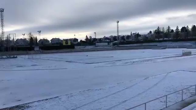 Pitch for Unionistas vs Real Madrid Copa del Rey game covered in snow
