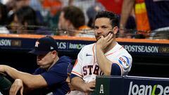 HOUSTON, TEXAS - OCTOBER 23: Jose Altuve #27 of the Houston Astros looks on from the dugout against the Texas Rangers during the eighth inning in Game Seven of the American League Championship Series at Minute Maid Park on October 23, 2023 in Houston, Texas.   Carmen Mandato/Getty Images/AFP (Photo by Carmen Mandato / GETTY IMAGES NORTH AMERICA / Getty Images via AFP)
