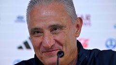 Brazil's coach Tite attends a press conference at the Qatar National Convention Center (QNCC) in Doha on November 23, 2022, on the eve of the Qatar 2022 World Cup football match between Brazil and Serbia. (Photo by NELSON ALMEIDA / AFP) (Photo by NELSON ALMEIDA/AFP via Getty Images)