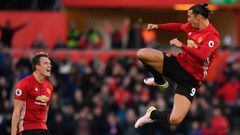 Zlatan Ibrahimovic of Manchester United celebrates scoring his sides second goal with Phil Jones