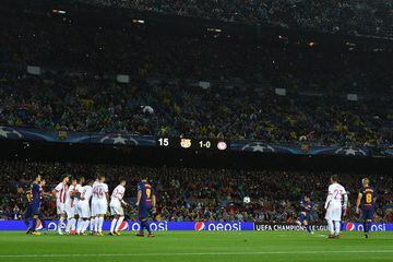 2-0. Lionel Messi scores with a free kick.