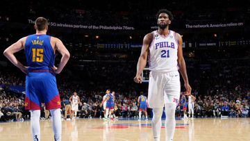 Joel Embiid #21 of the Philadelphia 76ers looks on during the game against the Denver Nuggets on January 28, 2023 at the Wells Fargo Center in Philadelphia, Pennsylvania.