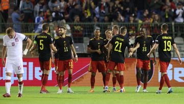 Belgium's players celebrate scoring their team's third goal during the UEFA Nations League - League A - Group 4 football match between Belgium and Poland at The King Baudouin Stadium in Brussels, on June 8, 2022. (Photo by Kenzo TRIBOUILLARD / AFP)