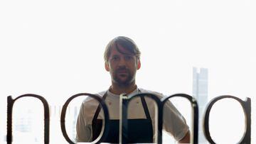 FILE PHOTO: Rene Redzepi, the head chef of Noma in Copenhagen, poses for pictures behind the logo of Noma after an interview with Reuters at Noma at Mandarin Oriental Tokyo February 10, 2015. REUTERS/Yuya Shino/File Photo