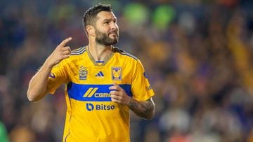 Tigres' French forward #10 Andre-Pierre Gignac celebrates after scoring against Puebla during their Mexican Apertura 2023 football tournament match at the Universitario stadium in Monterrey, Mexico, on December 3, 2023. (Photo by Julio Cesar AGUILAR / AFP)