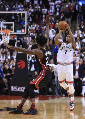 Kyle Lowry #7 of the Toronto Raptors hits a half-court buzzer beater to tie Game One and send it into overtime.