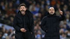 Soccer Football - Champions League - Quarter-Final - First Leg - Manchester City v Atletico Madrid - Etihad Stadium, Manchester, Britain - April 5, 2022 Atletico Madrid coach Diego Simeone reacts as Manchester City manager Pep Guardiola looks on REUTERS/C