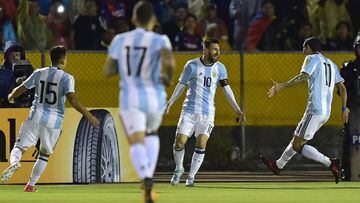 (FILES) This file photo taken on October 10, 2017 shows Argentina&#039;s Lionel Messi (2-R) celebrating after scoring against Ecuador during their 2018 World Cup qualifier football match in Quito. Argentine Football Association president Claudio Tapia admits that &quot;Manuel the Warlock&quot; deserves part of the credit for Argentina&#039;s victory against Ecuador and the team&#039;s qualification to the 2018 World Cup.   / AFP PHOTO / Rodrigo BUENDIA