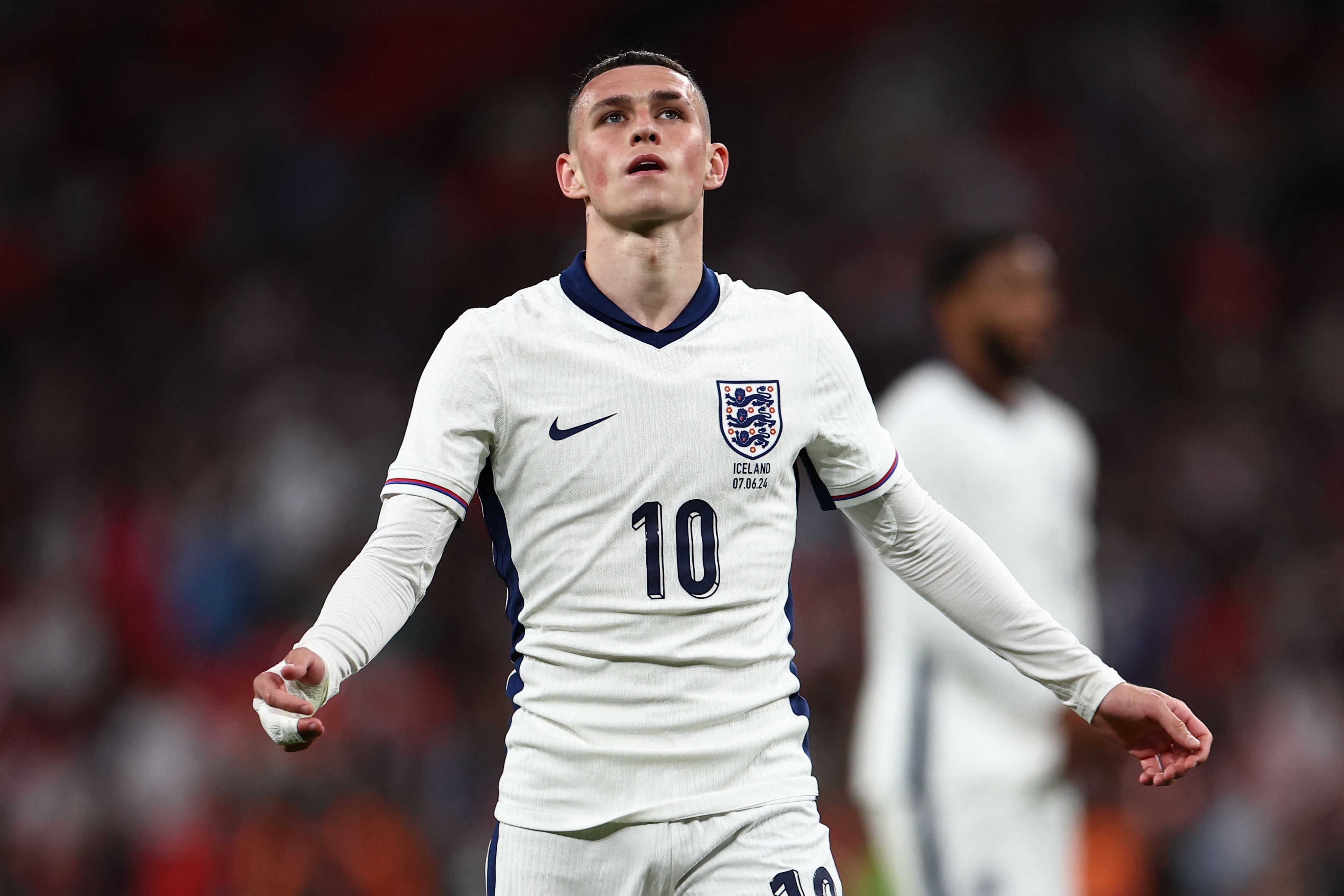 England's midfielder #10 Phil Foden reacts during the International friendly football match between England and Iceland at Wembley Stadium in London on June 7, 2024. (Photo by HENRY NICHOLLS / AFP) / NOT FOR MARKETING OR ADVERTISING USE / RESTRICTED TO EDITORIAL USE
