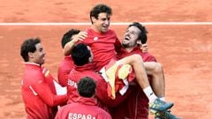 Spain&#039;s David Ferrer is carried by teammates as they celebrate after beating Germany during the Davis Cup quarter-final tennis match at the bullring of Valencia on April 8, 2018.  