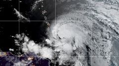 FILE PHOTO: FILE PHOTO: A satellite image shows Hurricane Elsa over the Lesser Antilles and approaching the Caribbean Sea July 2, 2021.  NOAA/Handout via REUTERS  THIS IMAGE HAS BEEN SUPPLIED BY A THIRD PARTY./File Photo
