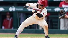 FAYETTEVILLE, ARKANSAS - APRIL 16: Zach Gregory #3 of the Arkansas Razorbacks bunts the ball during a game against the LSU Tigers at Baum-Walker Stadium at George Cole Field on April 16, 2022 in Fayetteville, Arkansas. The Razorbacks defeated the Tigers 6-2. (Photo by Wesley Hitt/Getty Images)