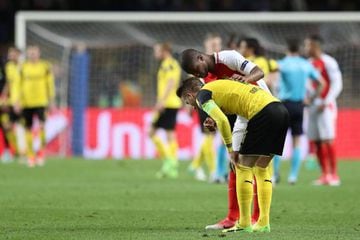 Monaco's Almamy Toure comforts Dortmund's Marco Reus after the UEFA Champions League quarter-final but the story could have been much worse.