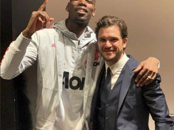 Kit Harrington, the actor who plays Jon Snow, is a big fan of Manchester United. Here he is posing with Paul Pogba.