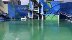 A picture taken on August 10, 2016 at the Maria Lenk Aquatics Stadium in Rio de Janeiro shows the diving pool of the Rio 2016 Olympic Games.  
 Red-faced Rio Olympics organisers anxiously waited for the diving water to turn back from a nervy green to classic blue as a lack of chemicals was revealed as the cause of the colour changes. Heavy rain slowed the flow of new chemicals added to the water which was also green in the pool used for the synchronised swimming and water-polo.
  / AFP PHOTO / CHRISTOPHE SIMON
