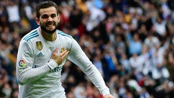 Real Madrid&#039;s Spanish defender Nacho Fernandez celebrates after scoring a goal during the Spanish league football match between Real Madrid and Sevilla at the Santiago Bernabeu Stadium in Madrid on December 9, 2017. / AFP PHOTO / PIERRE-PHILIPPE MARC
