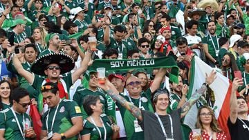 Mexico fans cheer during the Russia 2018 World Cup Group F football match between Mexico and Sweden at the Ekaterinburg Arena in Ekaterinburg on June 27, 2018. / AFP PHOTO / Hector RETAMAL / RESTRICTED TO EDITORIAL USE - NO MOBILE PUSH ALERTS/DOWNLOADS
 A
