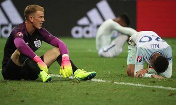 Goalkeeper Joe Hart (L) of England reacts at the end of the UEFA EURO 2016 round of 16 match between England and Iceland