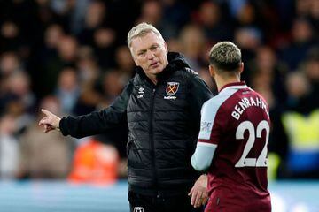 West Ham United's Scottish manager David Moyes (C) talks with West Ham United's Algerian midfielder Said Benrahma (R) at the final whistle during the English Premier League football match between Watford and West Ham United at Vicarage Road Stadium in Wat