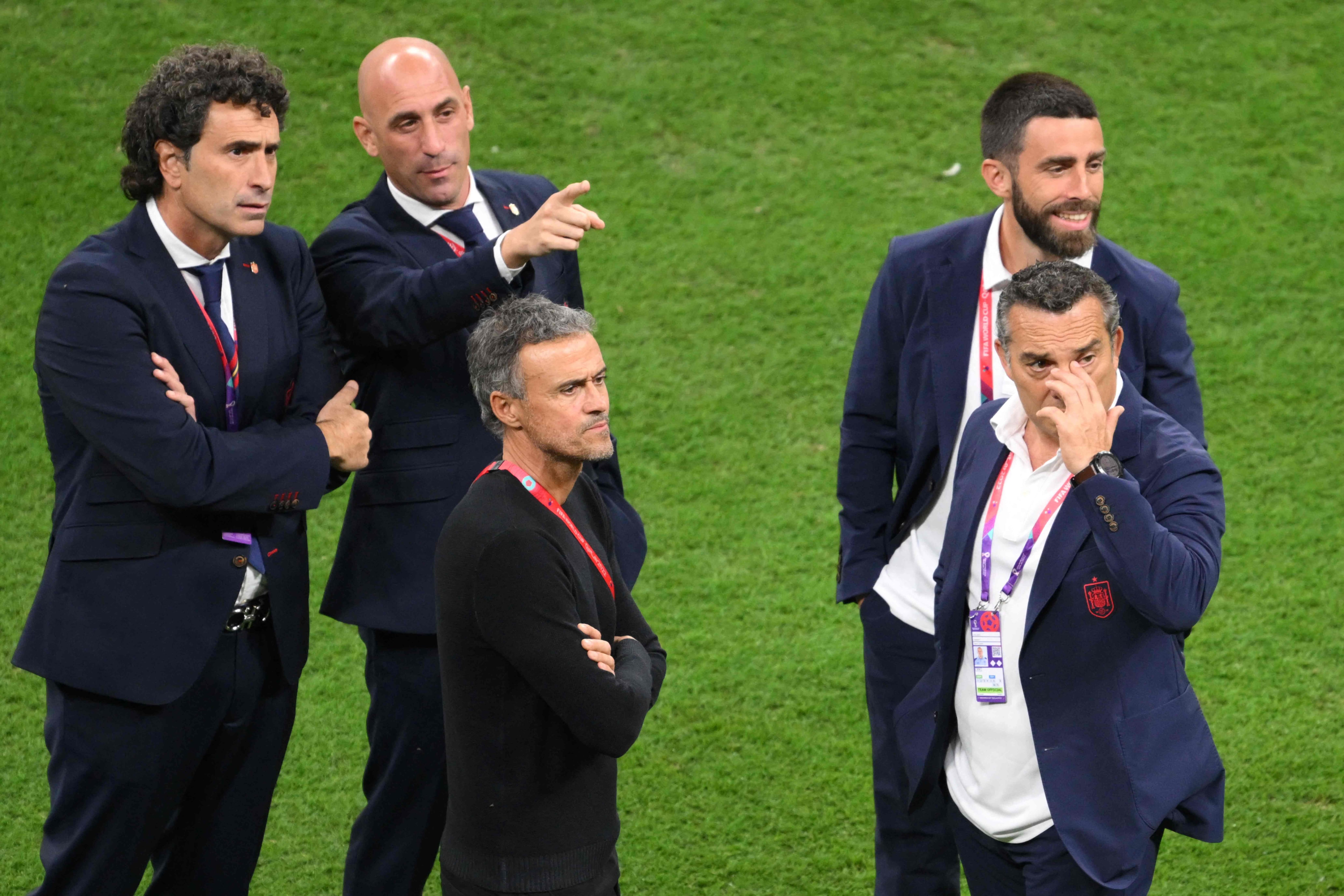 The President of the Royal Spanish Football Federation, Luis Rubiales (2-L) and Spain's coach Luis Enrique (C) look on ahead of the Qatar 2022 World Cup Group E football match between Spain and Germany at the Al-Bayt Stadium in Al Khor, north of Doha on November 27, 2022. (Photo by NICOLAS TUCAT / AFP)